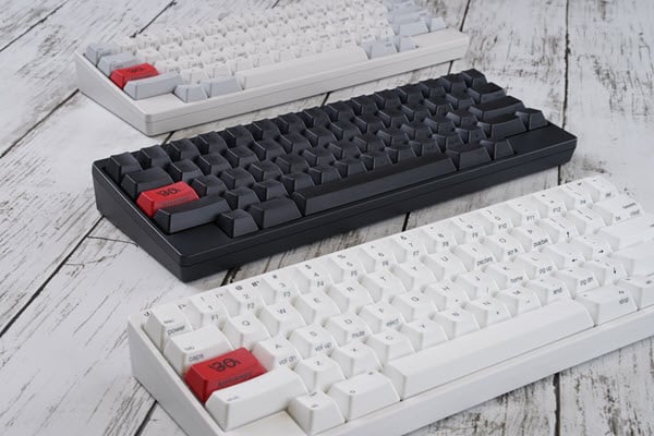 Image of three HHKB keyboards.