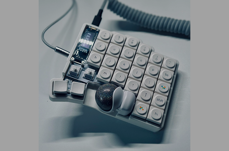 This is the Keyball61, a separate keyboard of his own design.