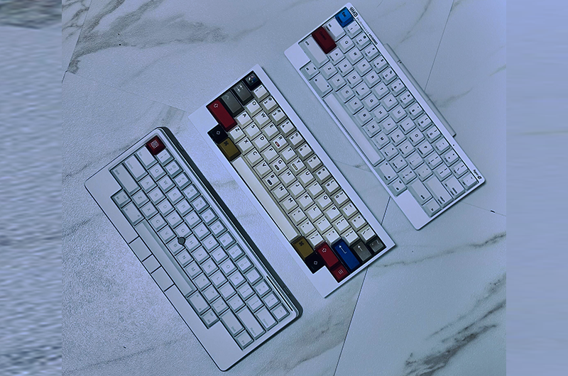 Some of the keyboards used by Jason. From left to right: HHKB Studio Snow model, tofu60 2.0 customized to HHKB specifications, HHKB Professional HYBRID Type-S Snow model
